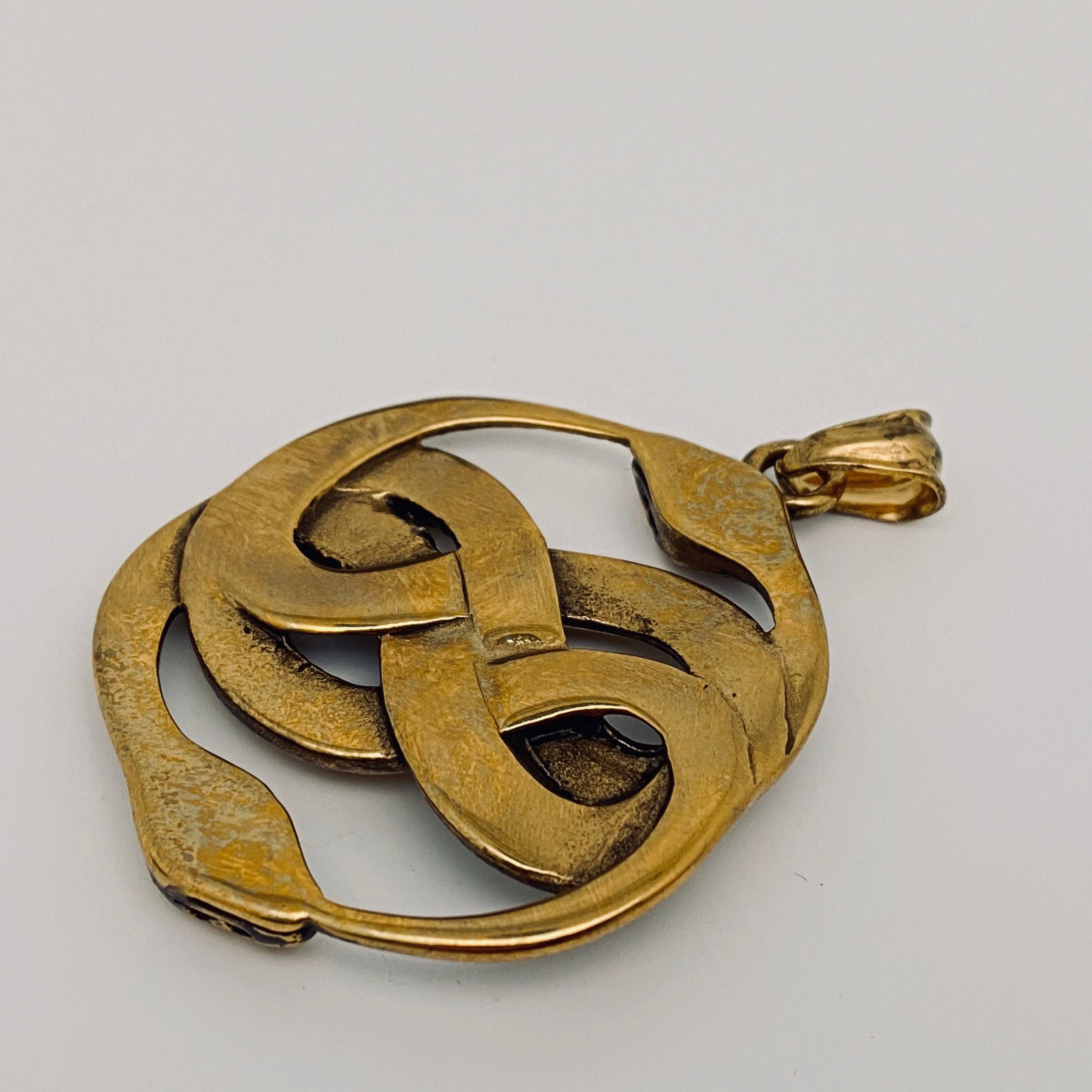 Mio Queena - Vente Matériels de bricolage - Pendentif en acier inoxydable à double enroulement en forme de serpent - MJ/MNP1