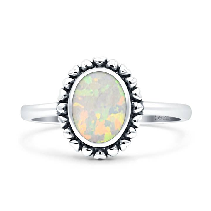 Bague solitaire en forme de cœur en opale blanche de laboratoire ovale oxydée pour la vente par Blue Apple Imports