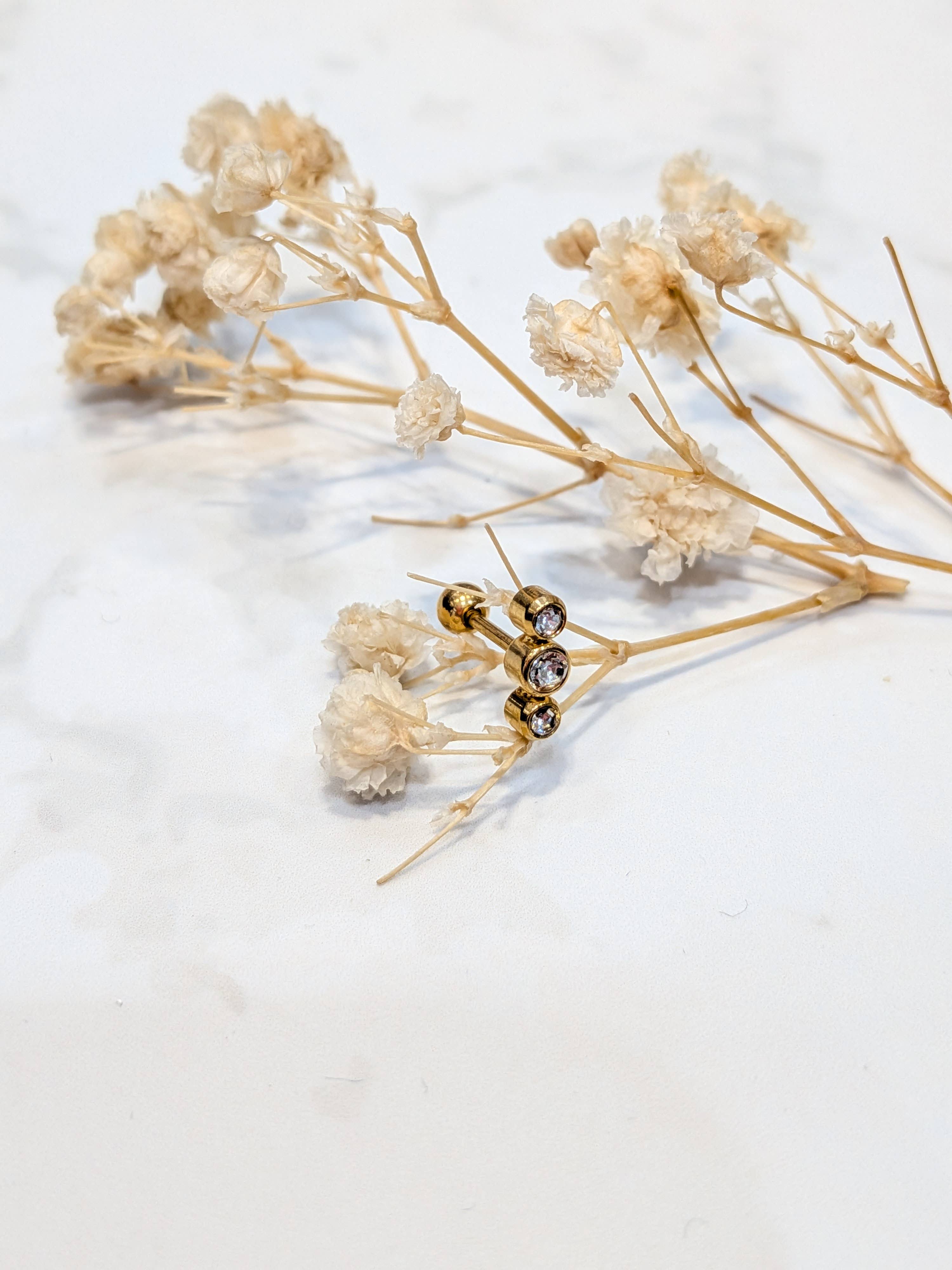 Gold 7mm zirconium stud earring for wholesale on Faire0