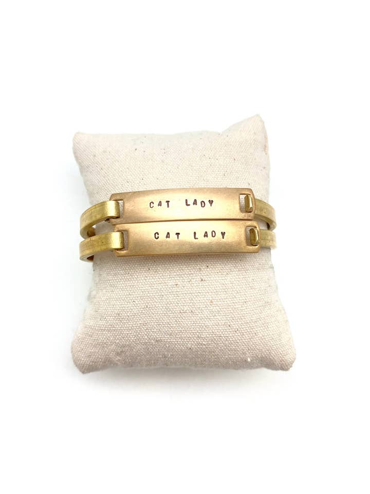 "Cat Lady" Stamped Clip-Cuff Brass Bracelet for wholesale by Stone Cooper