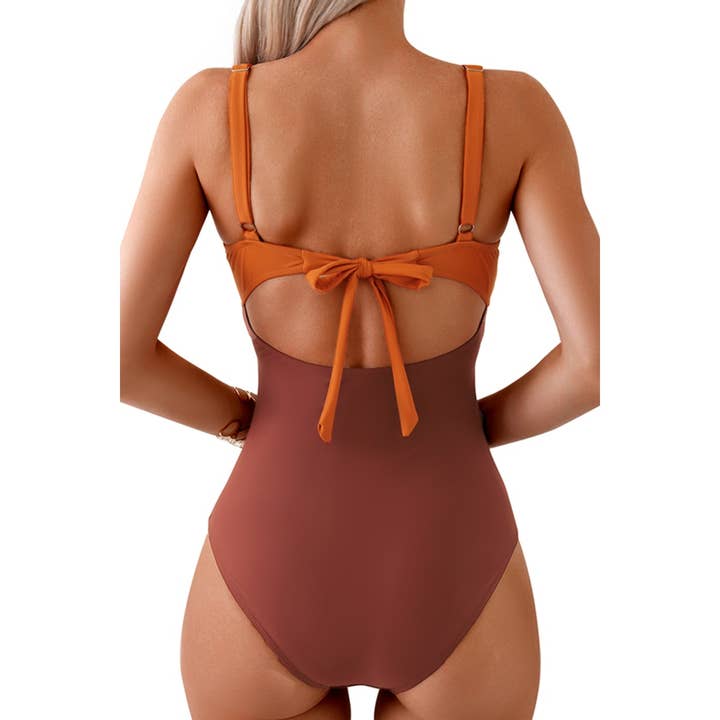 FUCHSIA ZWART Badpak met uitgesneden pasvorm en kleurblokken uit één stuk voor groothandel op Faire7