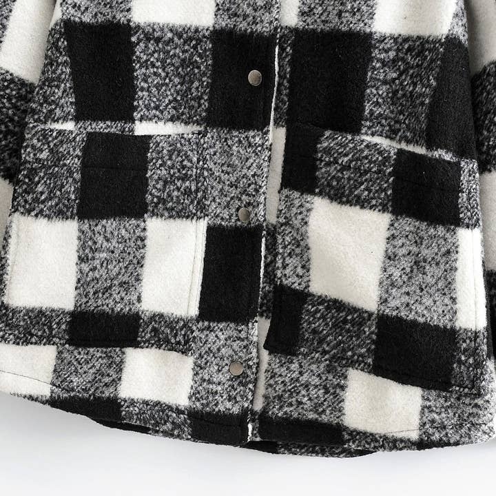 Manteau à carreaux Chi pour la vente par Revella The Label