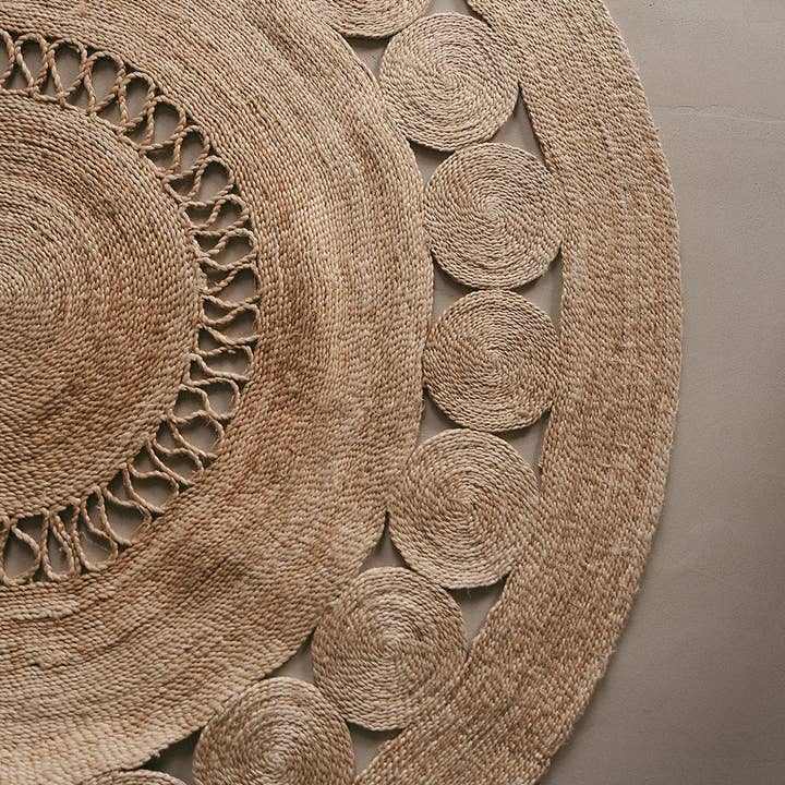 Round beige natural fiber rug for wholesale by Andrea House