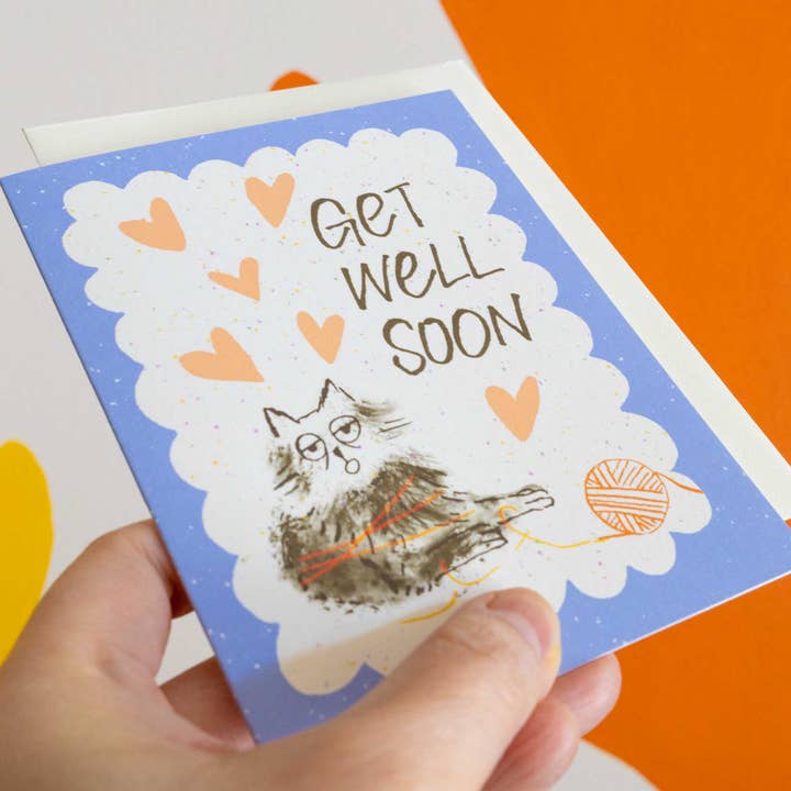 Esther Nariyoshi Illustrations - Wholesale Get Well Card - Get Well Cat with Yarn Greeting Card, A2, Blank Inside1