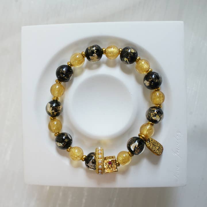 Golden Wealth Bracelet – Black & Gold Luxe Beads with Charm for wholesale by Auris Space