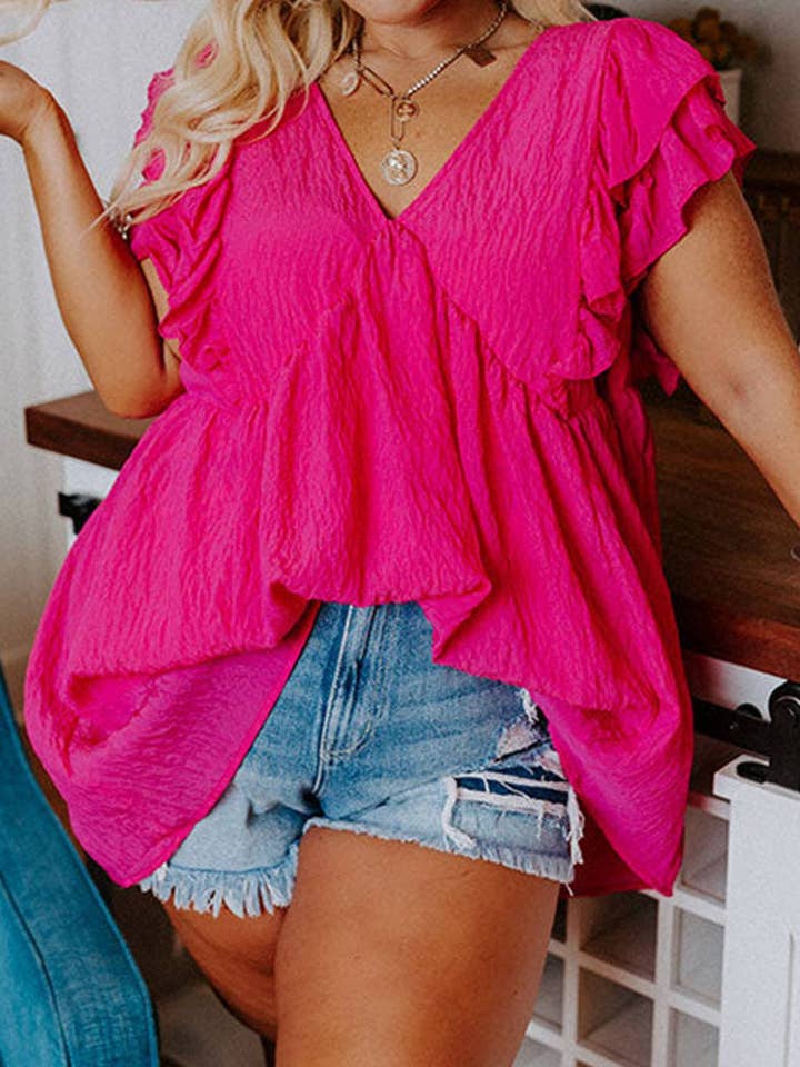 Top tunique à volants et col en V noué dans le dos de grande taille pour la vente par Exclusively Yourz