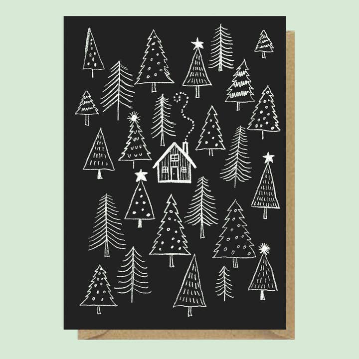 Log cabin in the woods A6 Christmas card for wholesale by Juliet Thomas Doodles