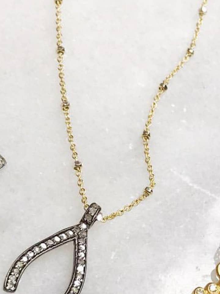 Collana con ciondolo a forma di braccio di diamante per la vendita all'ingrosso da parte di Rebecca Scott Jewelry