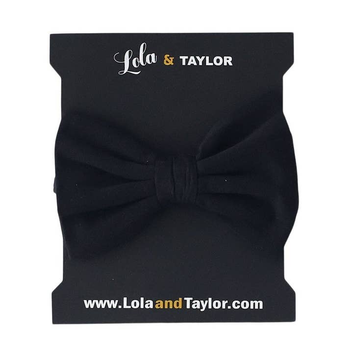 LTB2B2BH01 Lola & Taylor - Meisjes hoofdband met grote strik van biologisch katoen - gitzwart voor wholesale door Lola & Taylor