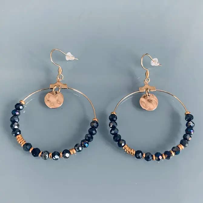 Argolas douradas e hematites azuis por atacado de Clovers