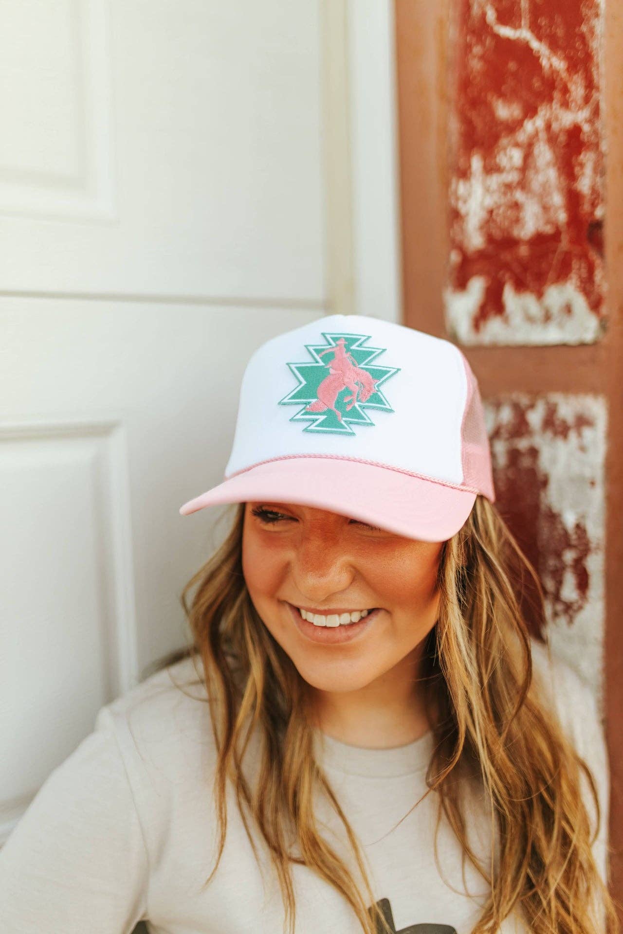 Pink White Aztec Bucking Bronco Patch Trucker Hat for wholesale on Faire2