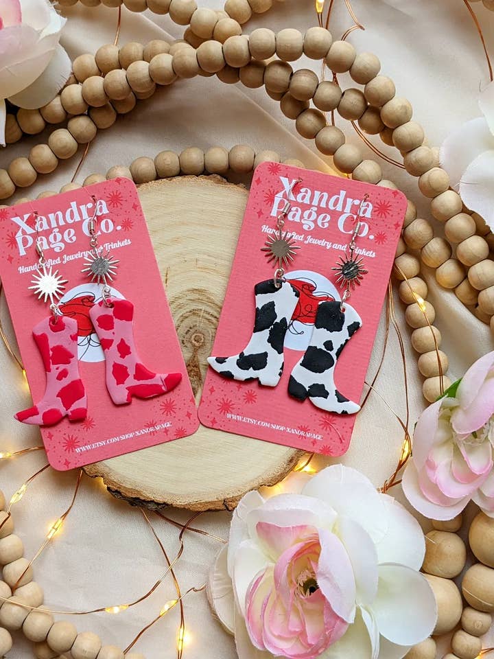 Cowboy Boot Earrings | Polymer Clay Cow print Pink & BW for wholesale by Xandra Page Co.