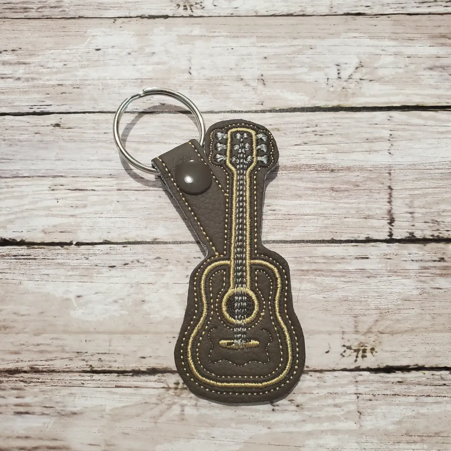 Deckard Designs, LLC - Wholesale Keychain - Unisex - Brown Vinyl Embroidered Guitar Key Chain Snap Tab0
