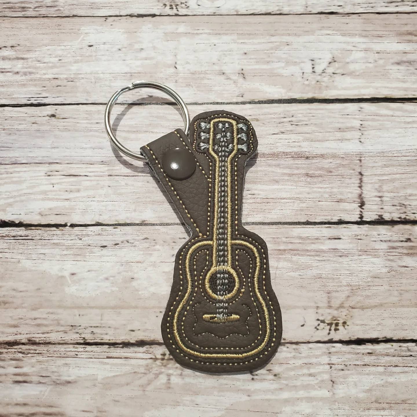 Deckard Designs, LLC - Wholesale Keychain - Unisex - Brown Vinyl Embroidered Guitar Key Chain Snap Tab