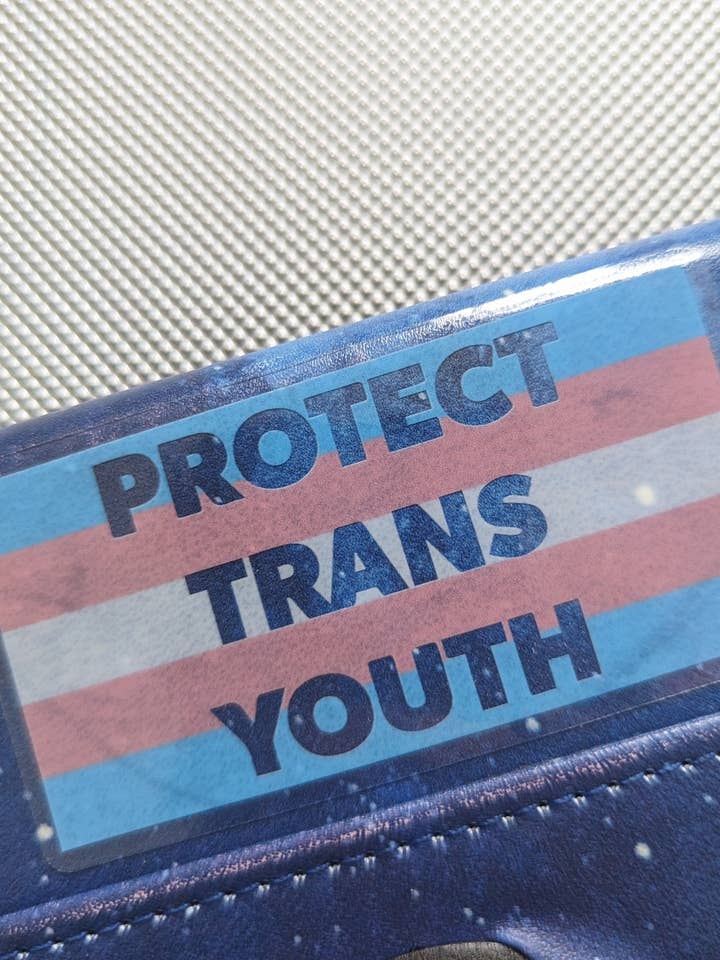 Protect Trans Kids Clear Back Sticker for wholesale by Sapphic Space