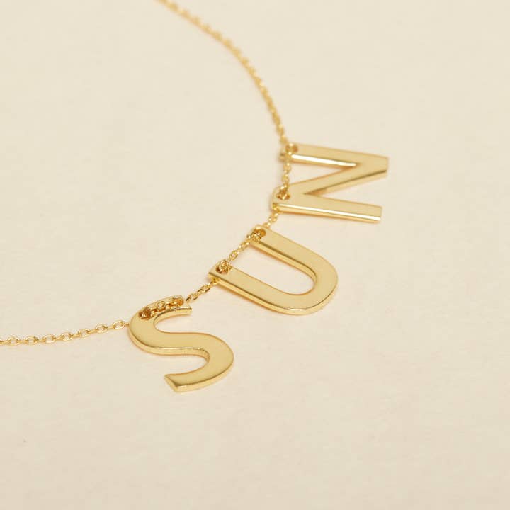 COLLIER LETTRE SUN pour la vente par Une A Une