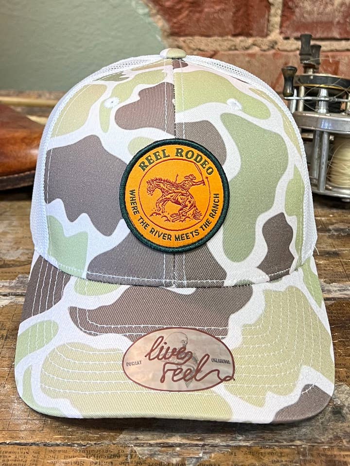 Fishin’ Cowboy in camo for wholesale by REEL RODEO Outdoors