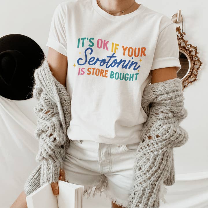 It's Okay if Your Serotonin is Store Bought Graphic Tee for wholesale by with love, aj.