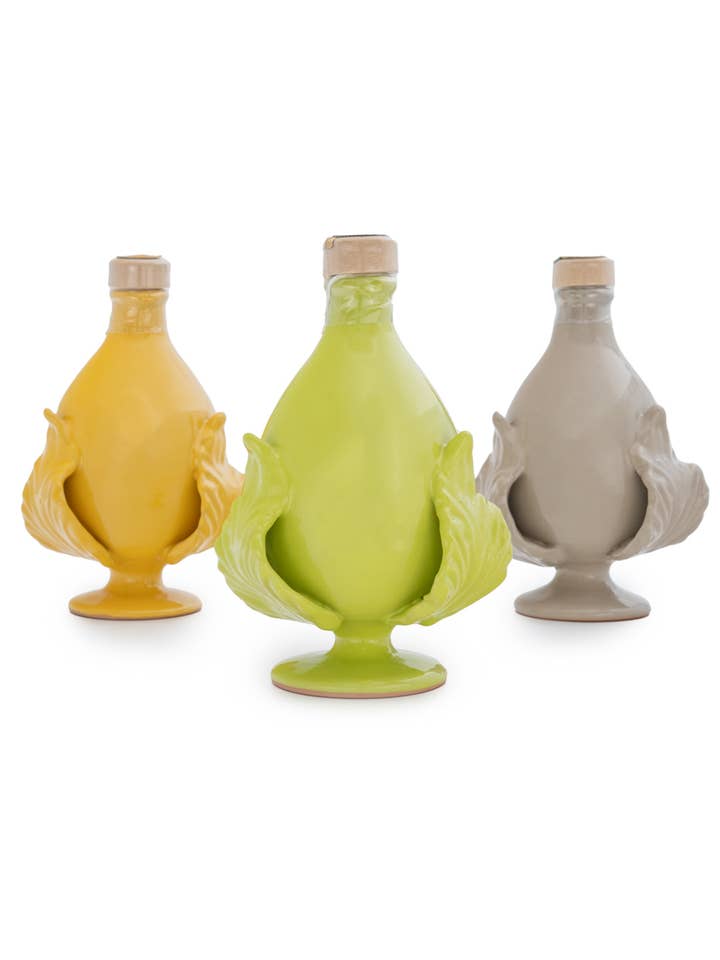 Ceramic oil jar handmade in Italy with organic extra virgin olive oil for wholesale by Terradiva Azienda Agricola Biologica