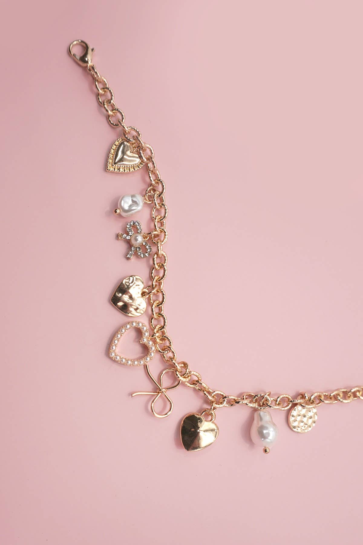Gold CHARM BRACELET-BOW HEART PEARL DISC CHARMS | 80B1290 for wholesale on Faire2