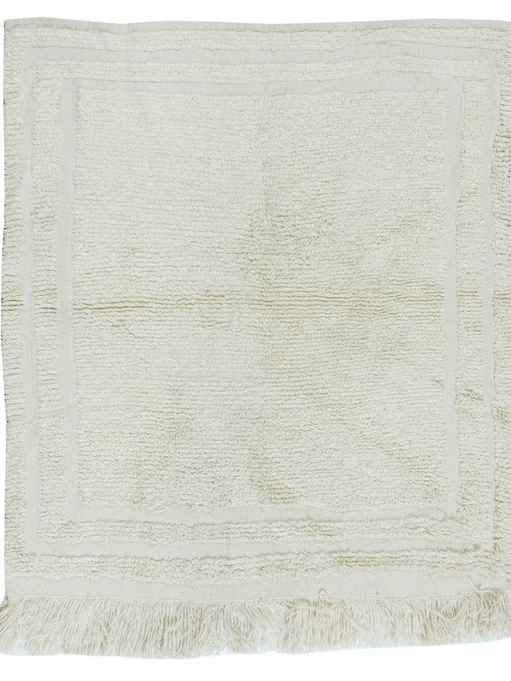 Vintage Handmade Tulu Rug in Solid Beige, 102 x 110 cm for wholesale by Rug Specialist LLC.
