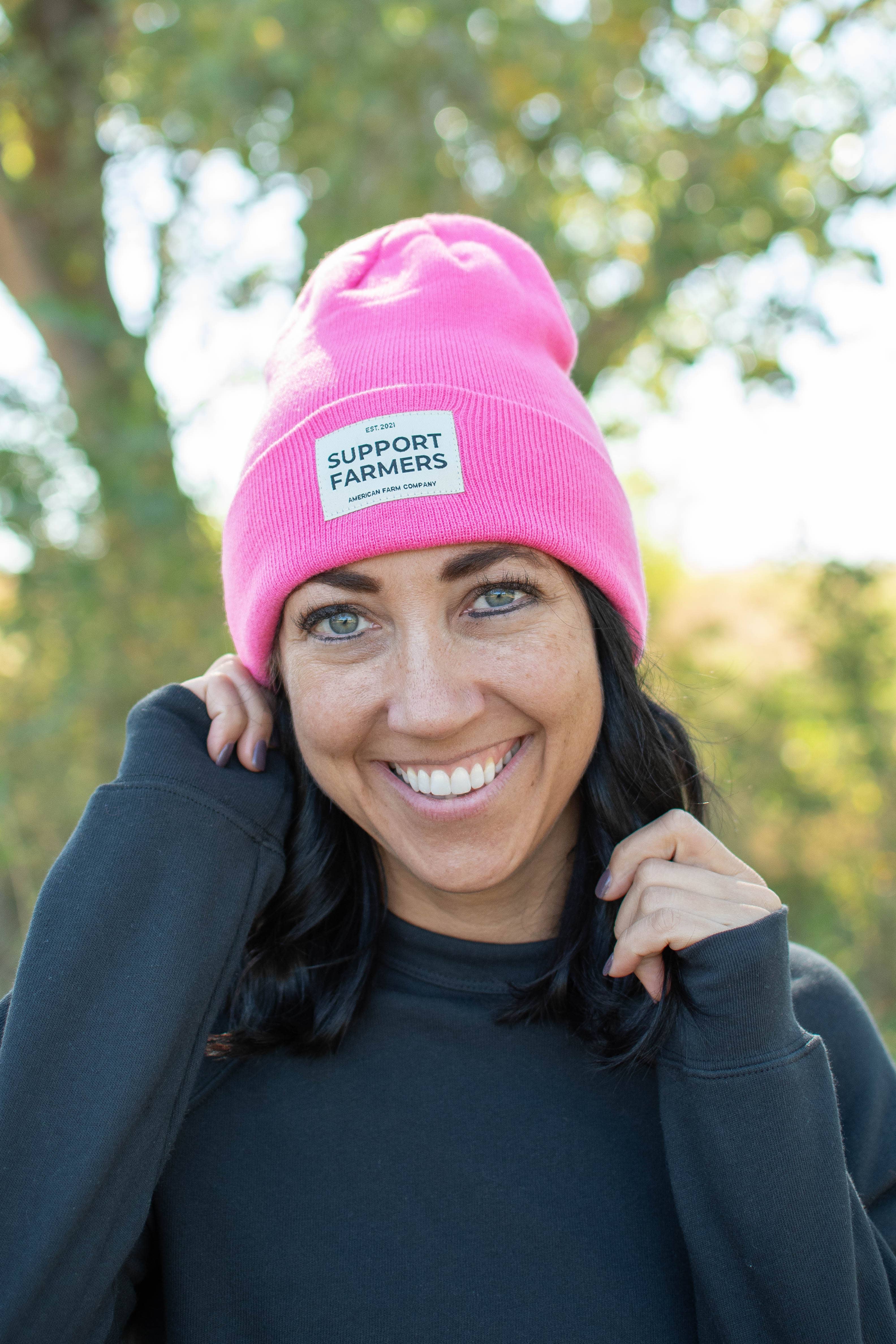 Hot Pink ‘Support Farmers’ Beanie for wholesale on Faire1