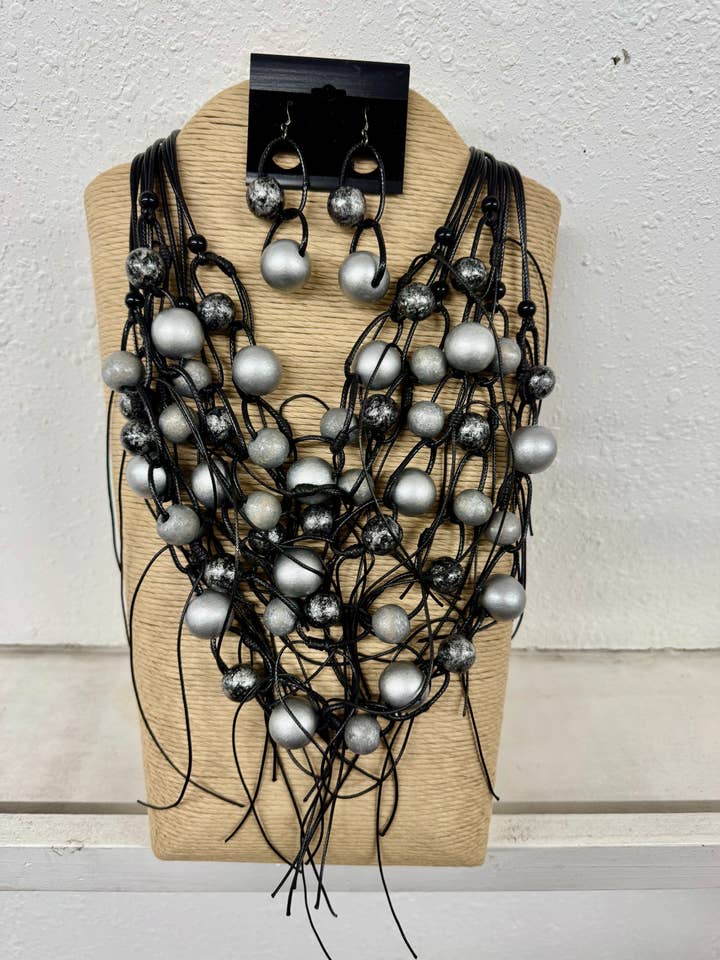10 STRANDS BLACK WAX CORD WITH SILVER AND BLACK WOOD BALLS W for wholesale by International Duru's