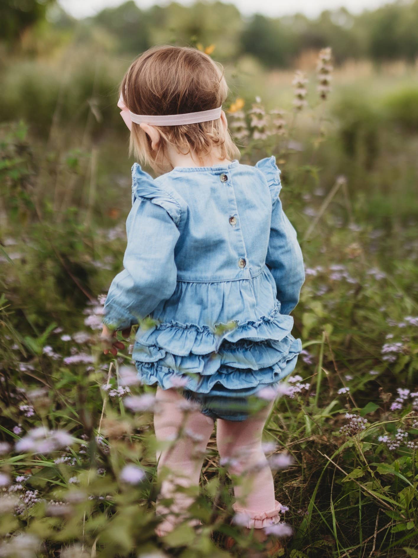 Blue Baby Girls Light Wash Denim Long Sleeve Flutter Bubble Romper for wholesale on Faire6