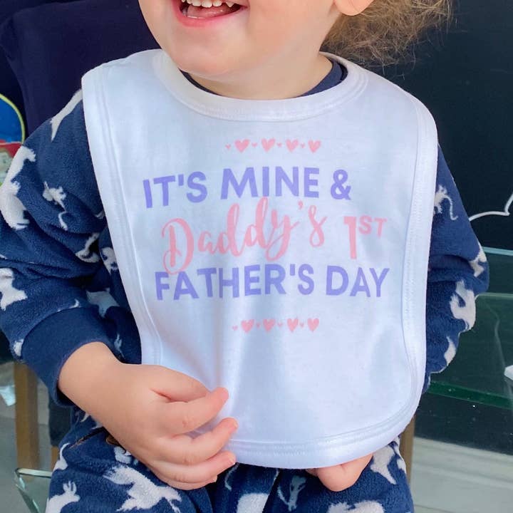 Baby bib- it’s mine and daddy’s first Father’s Day for wholesale by Giftieness
