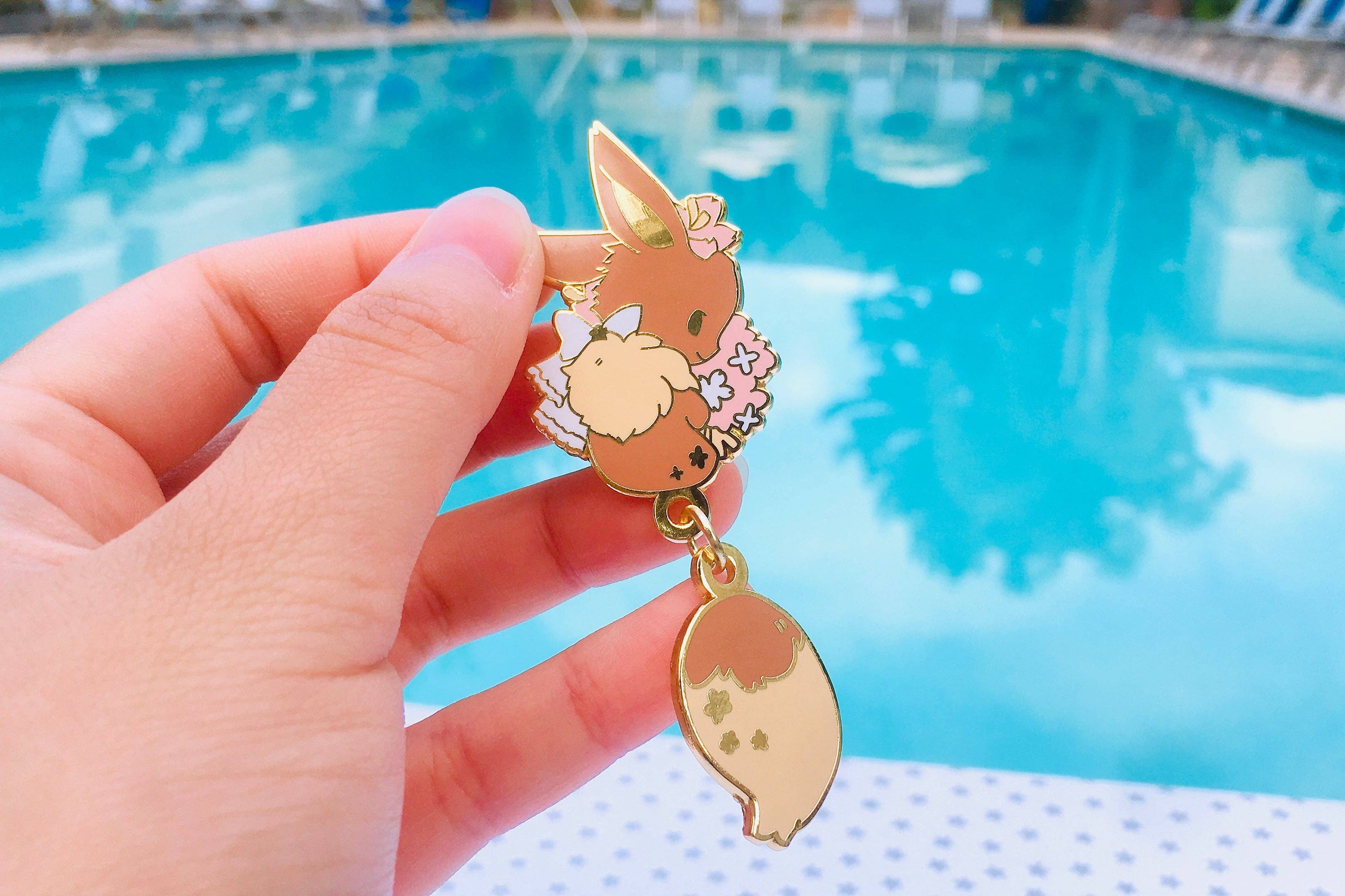 ToasterKiwi - Wholesale Lapel Pin/Button - Eevee Dangling Tail Enamel Pin 3.5"3