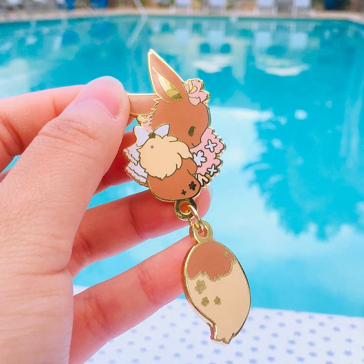 ToasterKiwi - Wholesale Lapel Pin/Button - Eevee Dangling Tail Enamel Pin 3.5"3