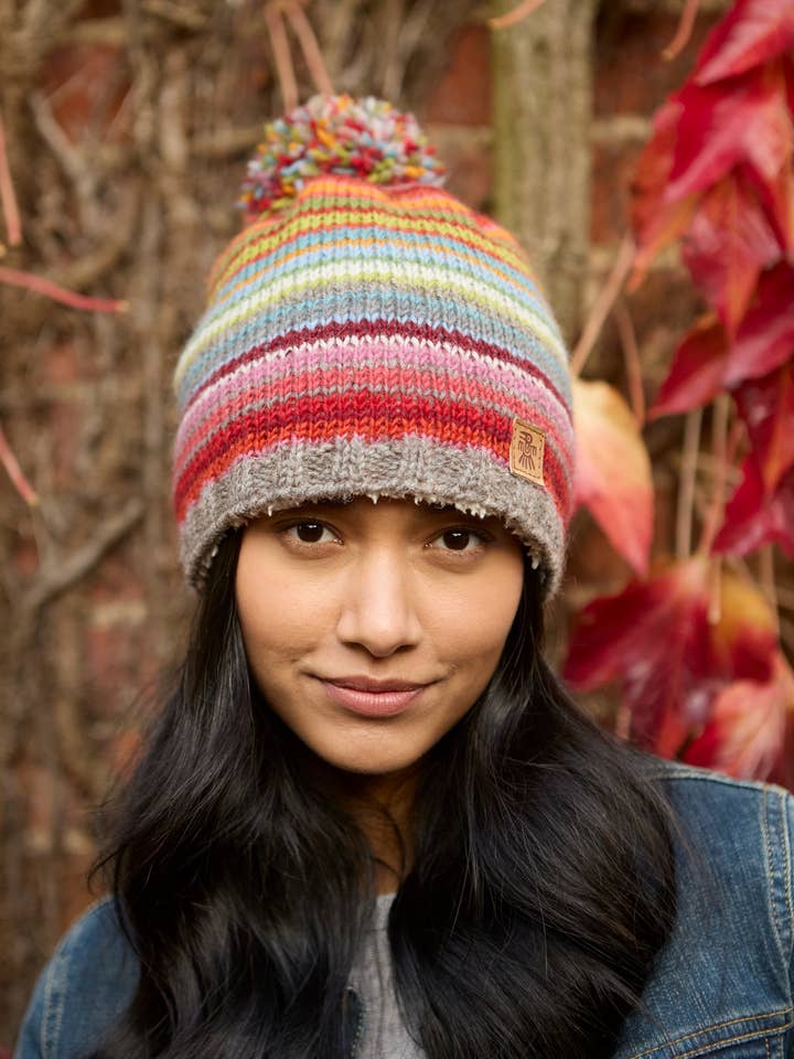 Seville Wool Knit Bobble Hat Sunset Striped Sherpa Fleece for wholesale by Pachamama Ltd
