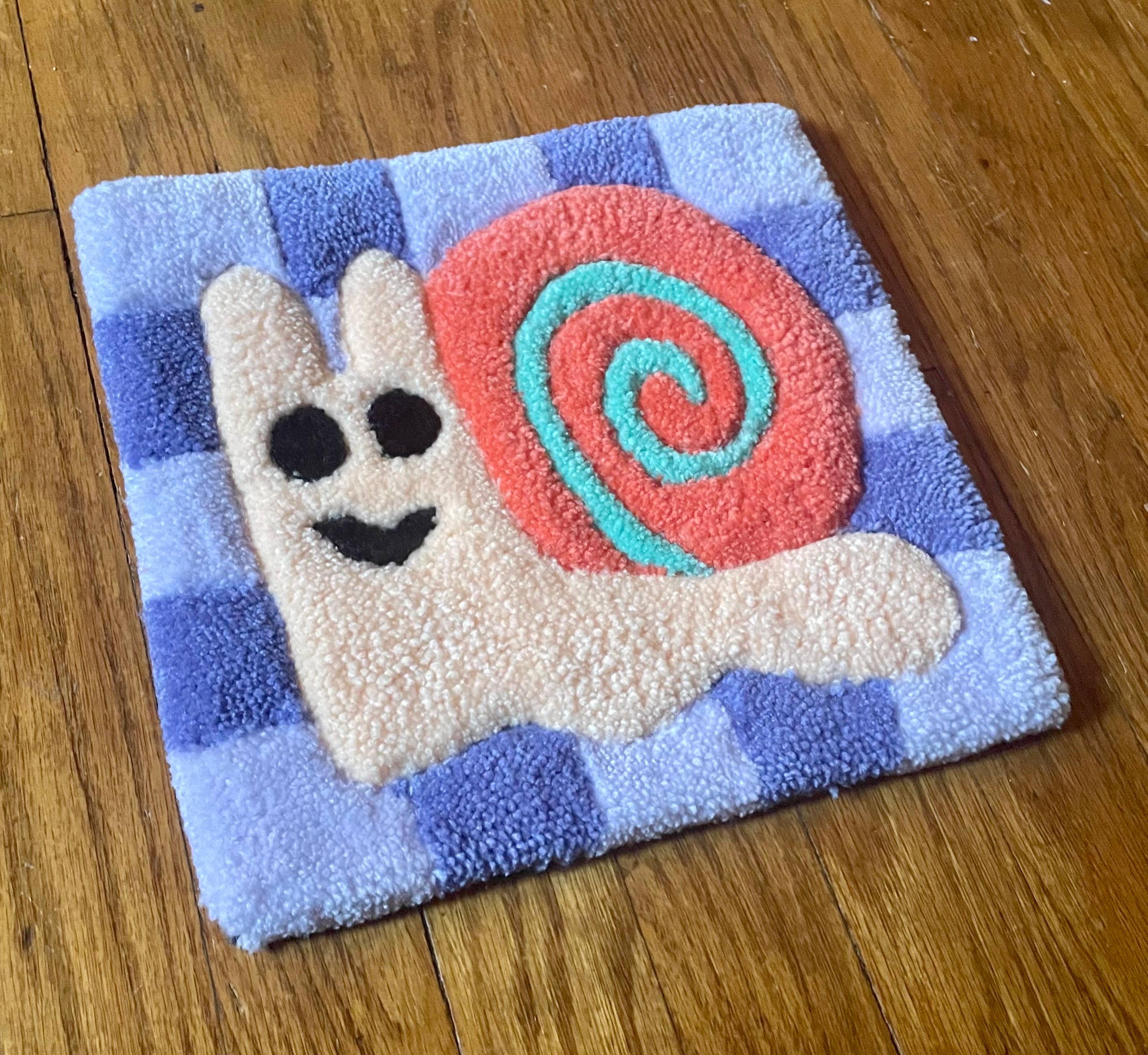 Hi Cutie – wholesale Wall Accent – Checkered Snail Tufted Wall Hanging1