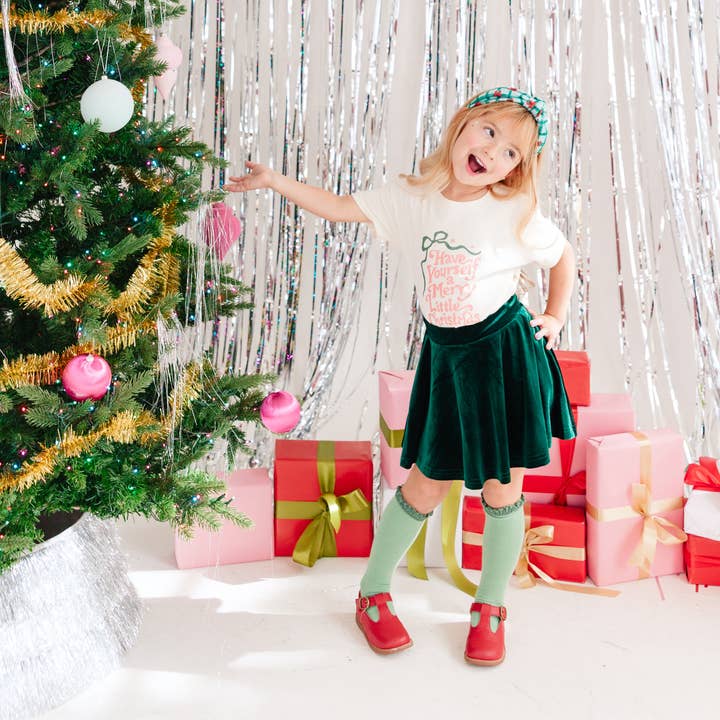 Have yourself a merry little Christmas Coquette Bow Shirt for wholesale by Benny & Ray Apparel