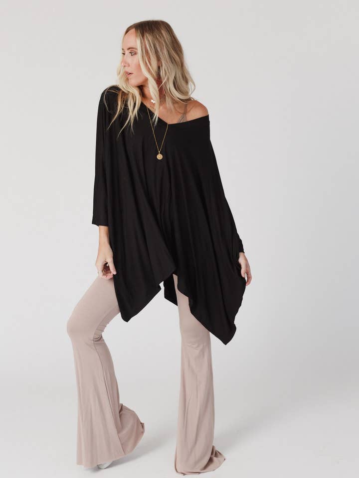 The Wren Boho Top - Black and other Purchase Wholesale tunic tops. Free Returns & Net 60 Terms on Faire trending on Faire.