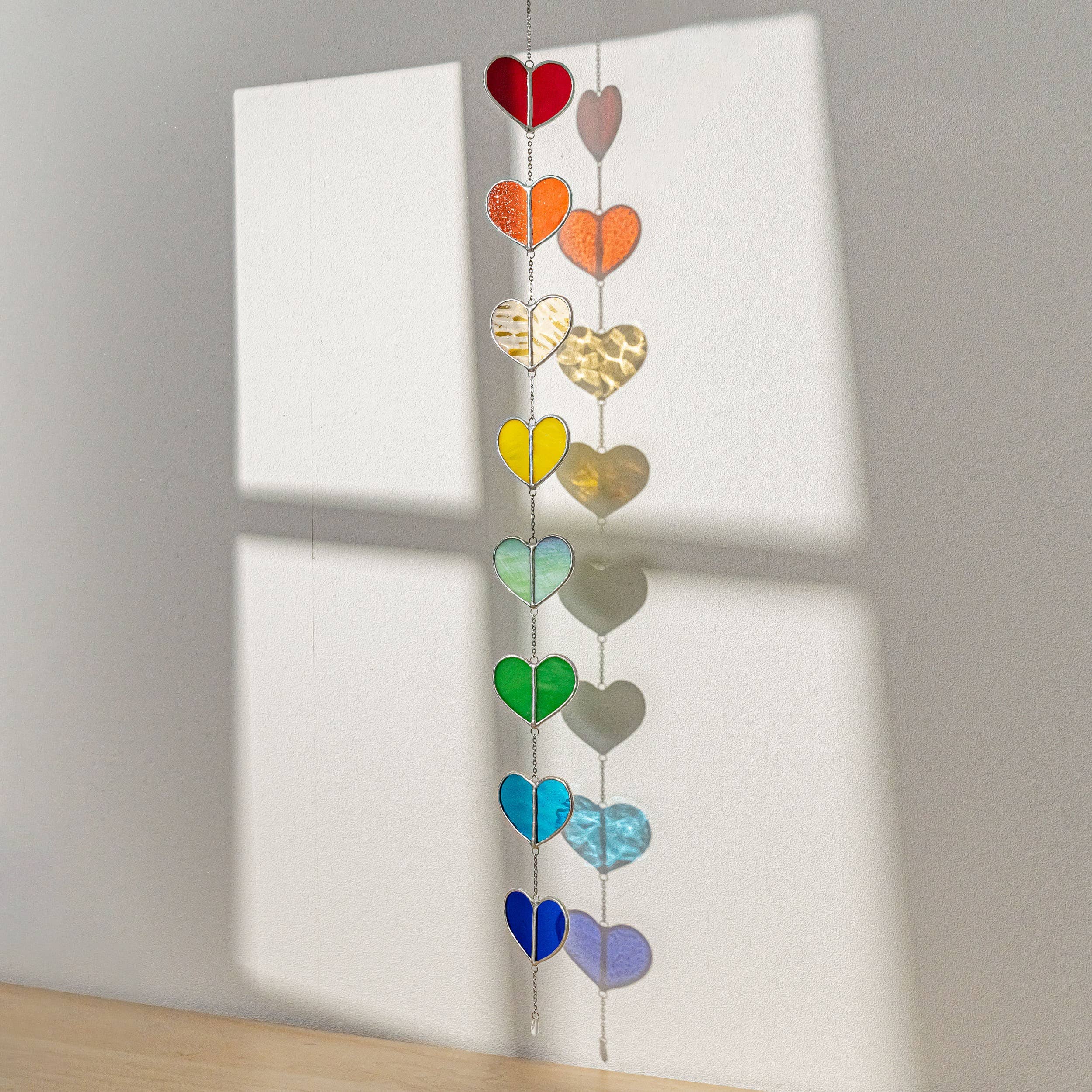 MondoBellissimo - Vendita all'ingrosso Bandierine/Ghirlande - Ghirlanda a cuore in vetro colorato F2216