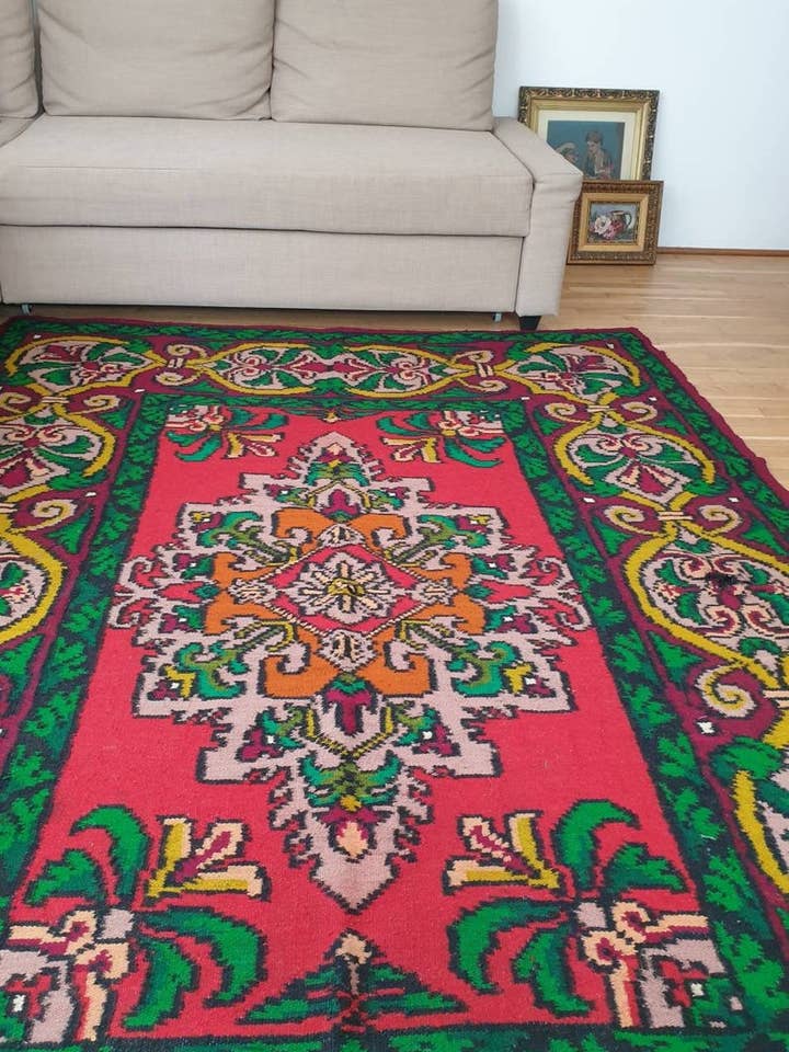 Antique Romanian large rug with green and red design for wholesale by MADE WITH LOVE RO SRL