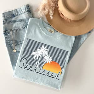 Purchase Wholesale sun kissed tee. Free Returns & Net 60 Terms on Faire