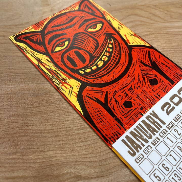 Pioneer House (formerly Yee-Haw) - Wholesale Calendar - 2025 Smiling Pig Woodcut Mini Calendar
