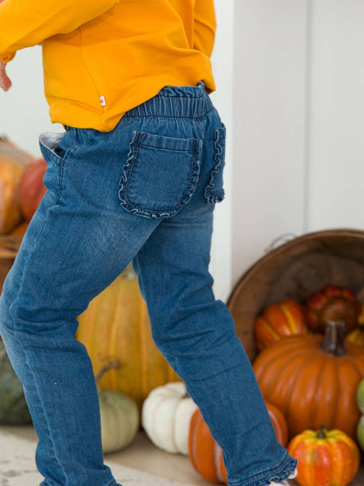 Girls Medium Wash Denim Ruffle Straight Jeans
for wholesale by RuffleButts + RuggedButts