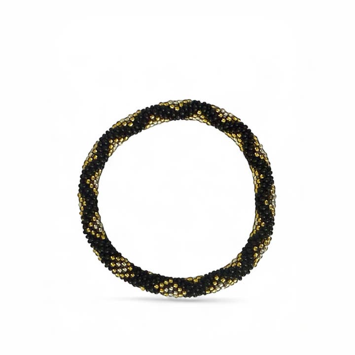 Black, beige, and gold Nepalese bracelet for wholesale by Maison Yvelise