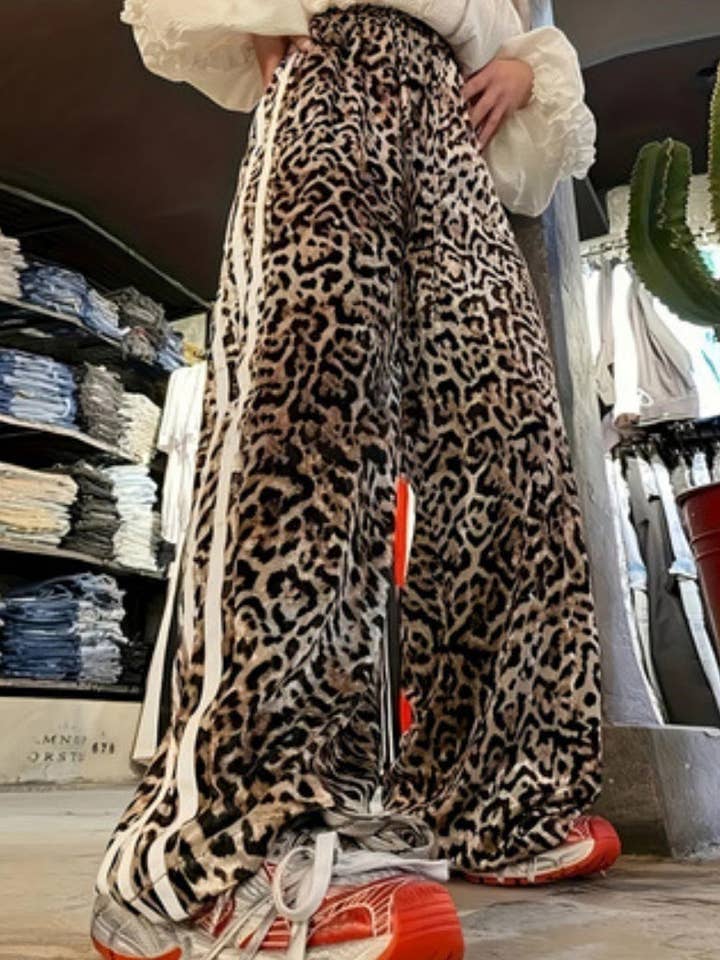 Wide-Leg Leopard Print Pants with Stripes and other Purchase Wholesale leopard print pants. Free Returns & Net 60 Terms on Faire trending on Faire.