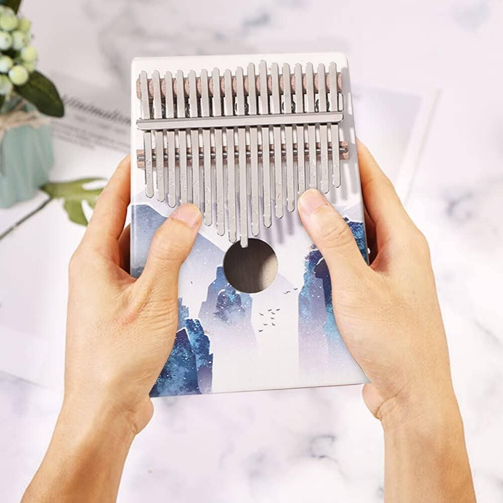 giftland - Vendita all'ingrosso Strumenti musicali - Kalimba colorata in legno con custodia in velluto