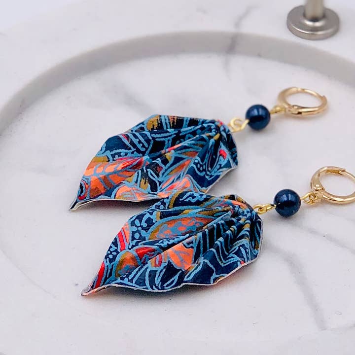 Origami jewelry leaf earrings with preciosa pearls and other Purchase Wholesale monederos kawaii. Free Returns & Net 60 Terms on Faire trending on Faire.