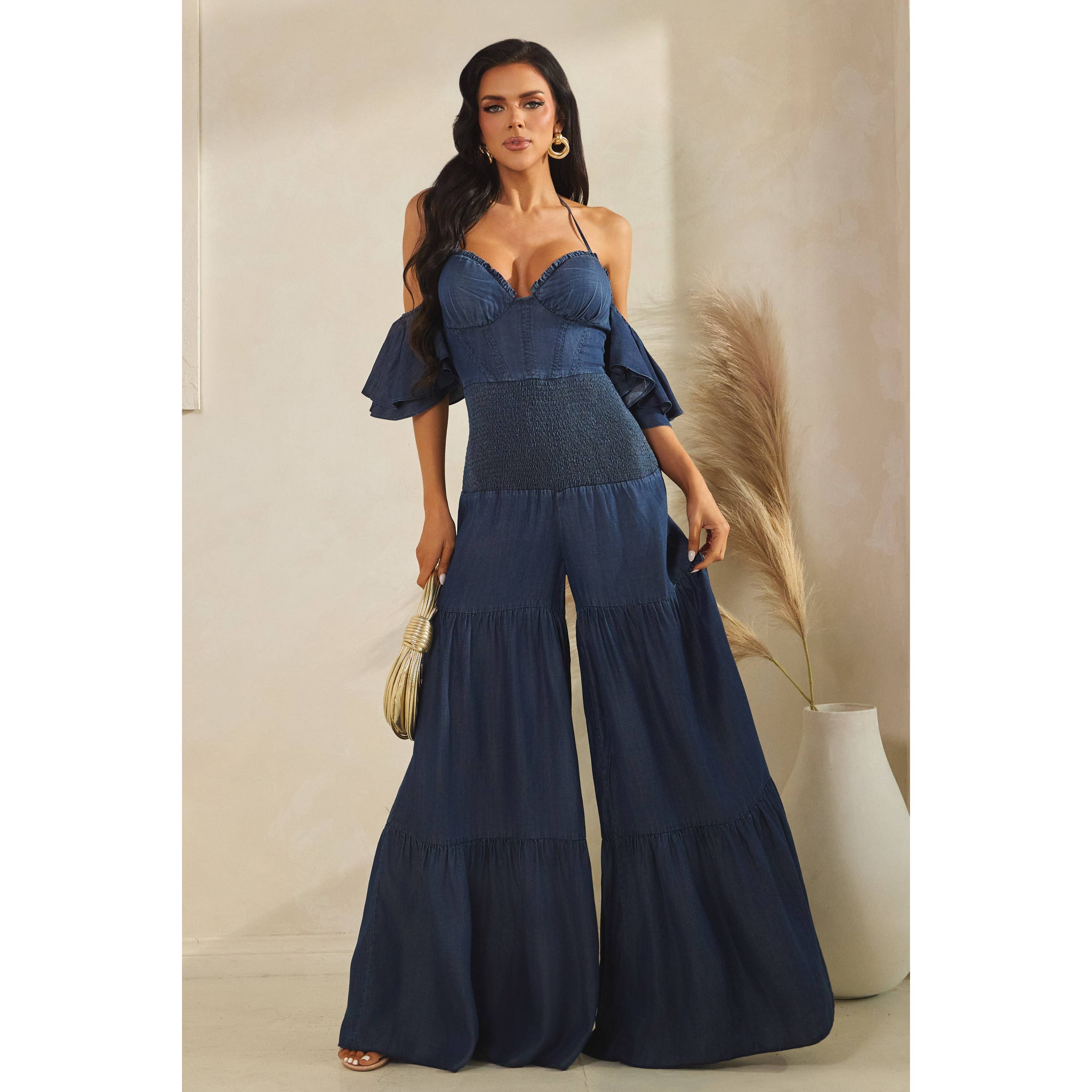 DARK DENIM MINI RUFFLE HALTER NECK TIERED JUMPSUITS for wholesale on Faire4