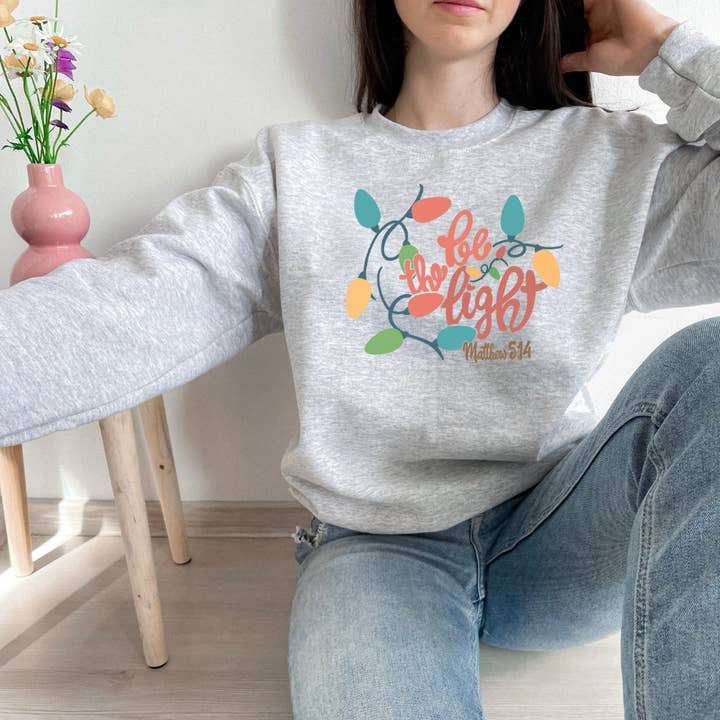 Wholehearted Motherhood and Co. - Wholesale Graphic Sweatshirt - Women's - Be The Light Christmas Sweatshirt - Christmas Graphic Tee