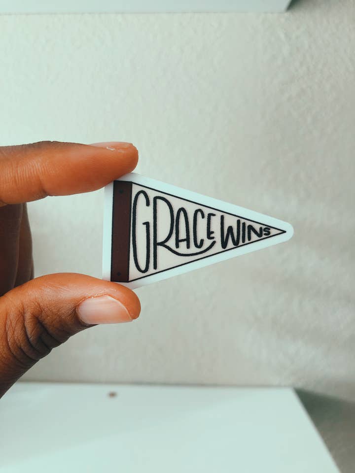 Grace Wins Vinyl Sticker for wholesale by dinahslettering