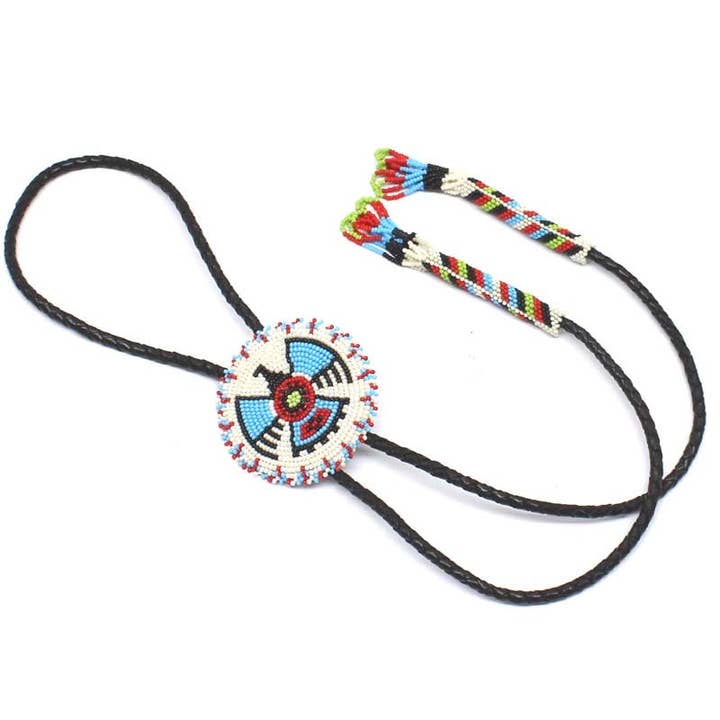 Handmade Cream Thunderbird Leather Bolo Tie with Beading, Adjustable Necklace Cord and other Purchase Wholesale leather necklace cord. Free Returns & Net 60 Terms on Faire trending on Faire.