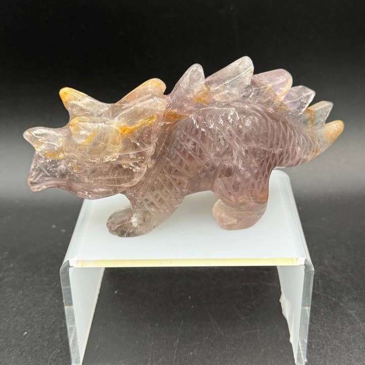 Amethyst w/ rutile Triceratops dinosaur carving H178 for wholesale by The 7 Directions