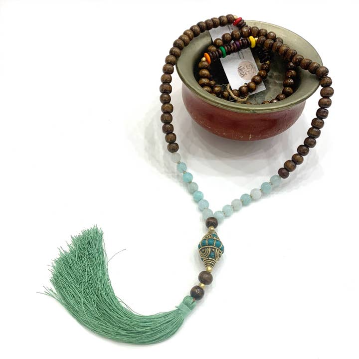MAITRI JAPAMALA ~ INNER PEACE GREEN ~ in Agarwood, 7/8 mm spheres, 108 grains and important tassel matched to the color of the stones. for wholesale by Atisha Spiritual Shop